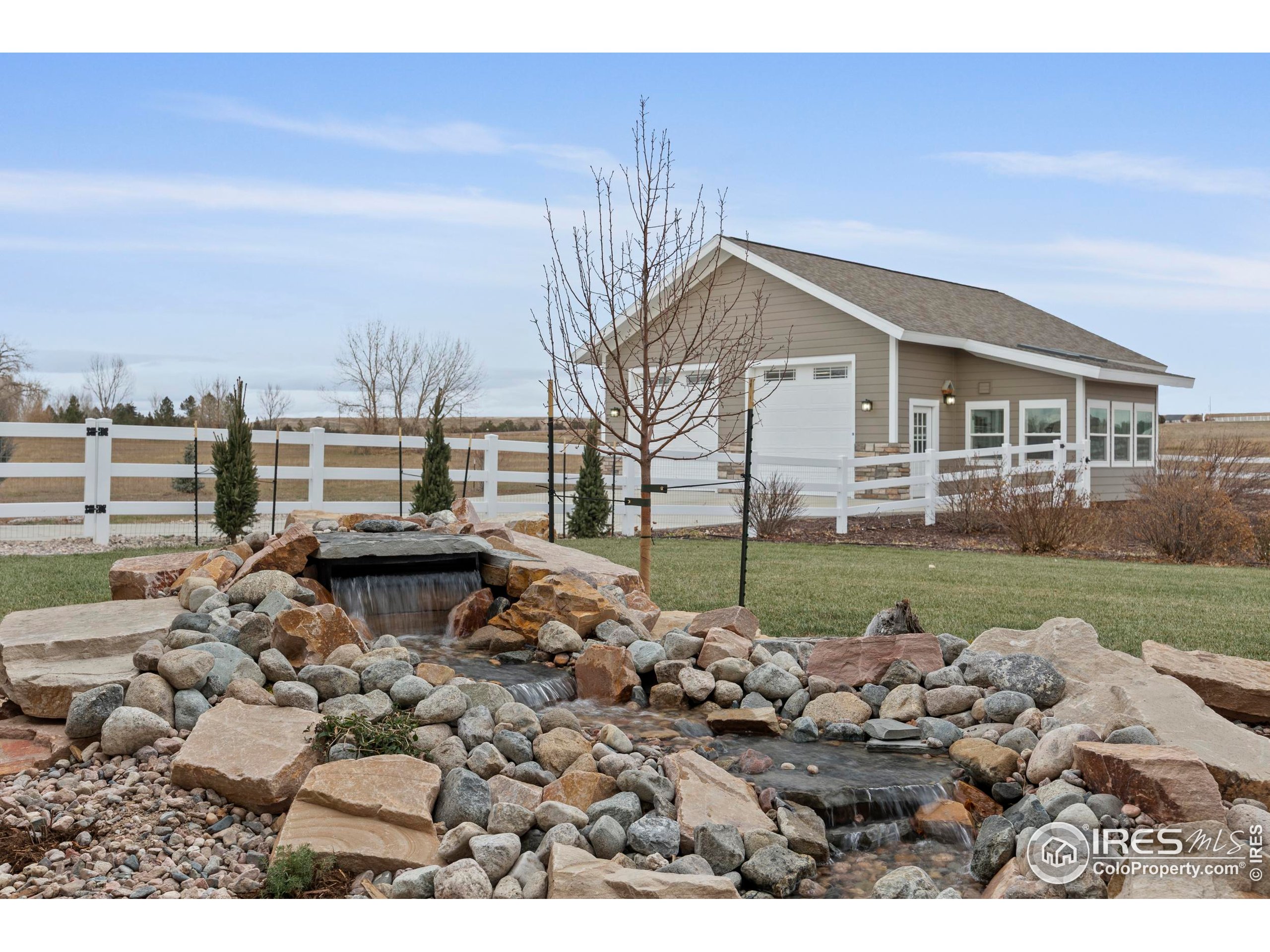 39884 Ridgecrest Court Severance, CO 80610 - Photo 33 of 44 a view of a house with a yard and sitting area