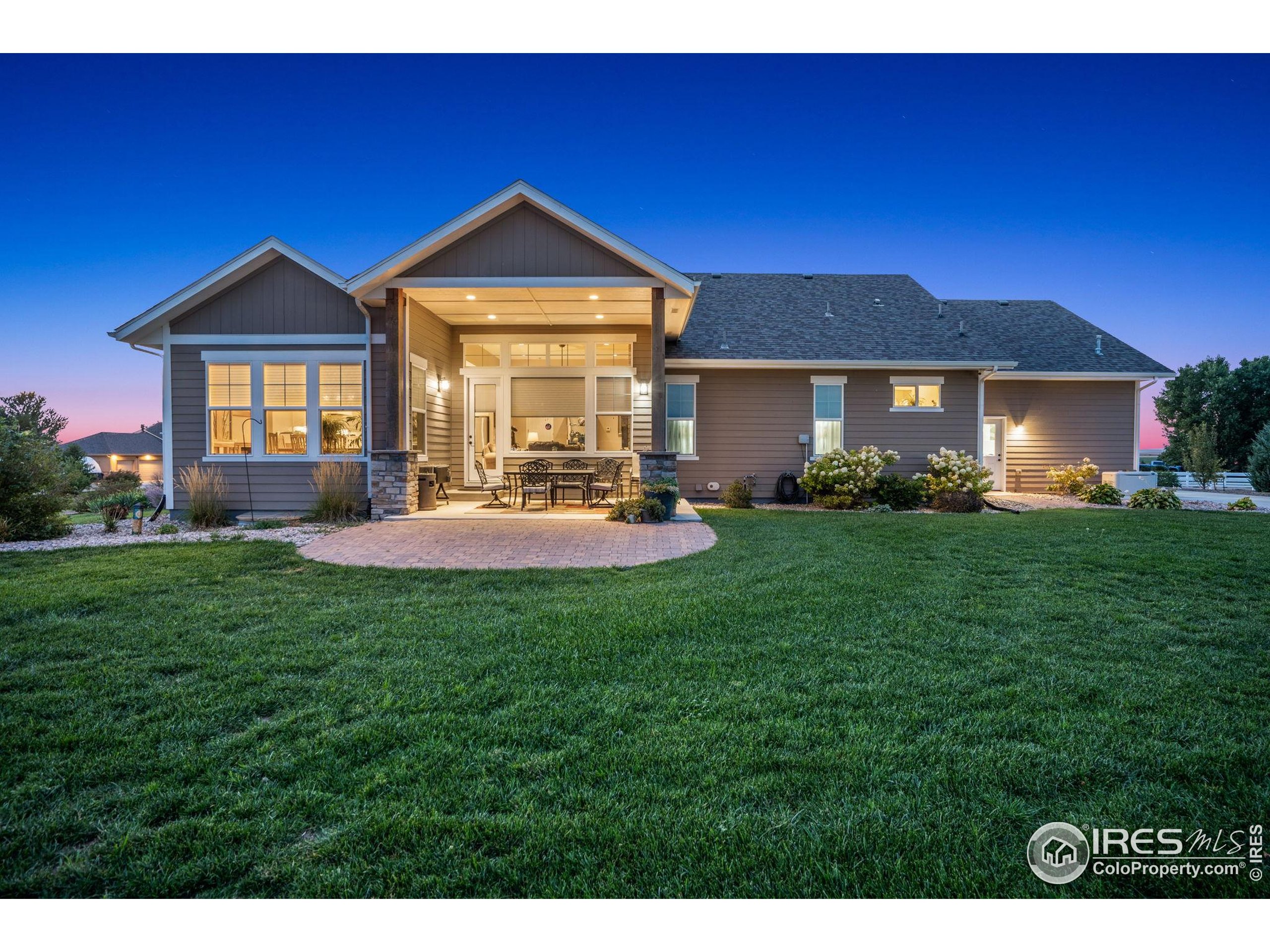 39884 Ridgecrest Court Severance, CO 80610 - Photo 42 of 44 a front view of a house with a yard