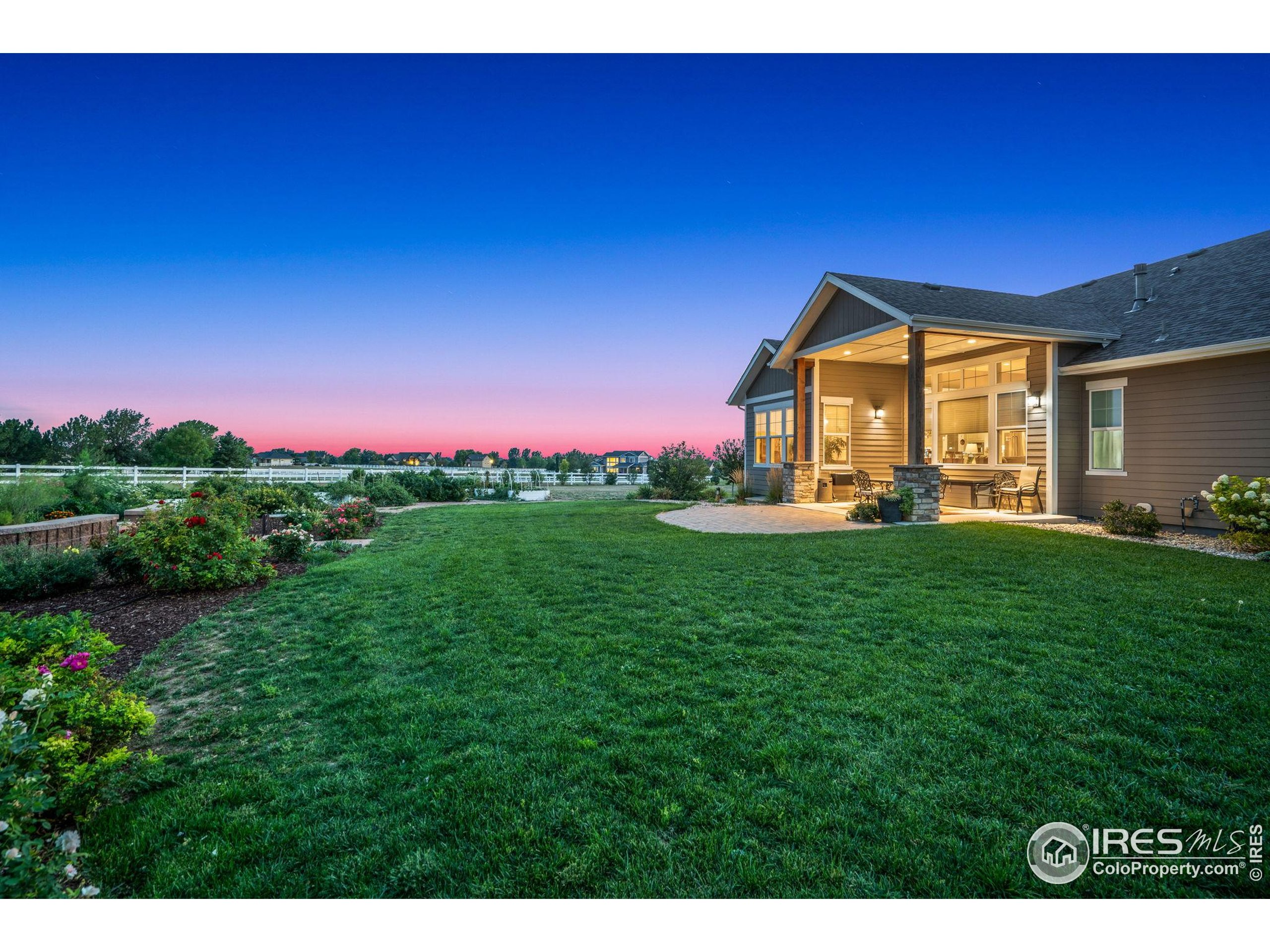 39884 Ridgecrest Court Severance, CO 80610 - Photo 43 of 44 a front view of a house with a yard