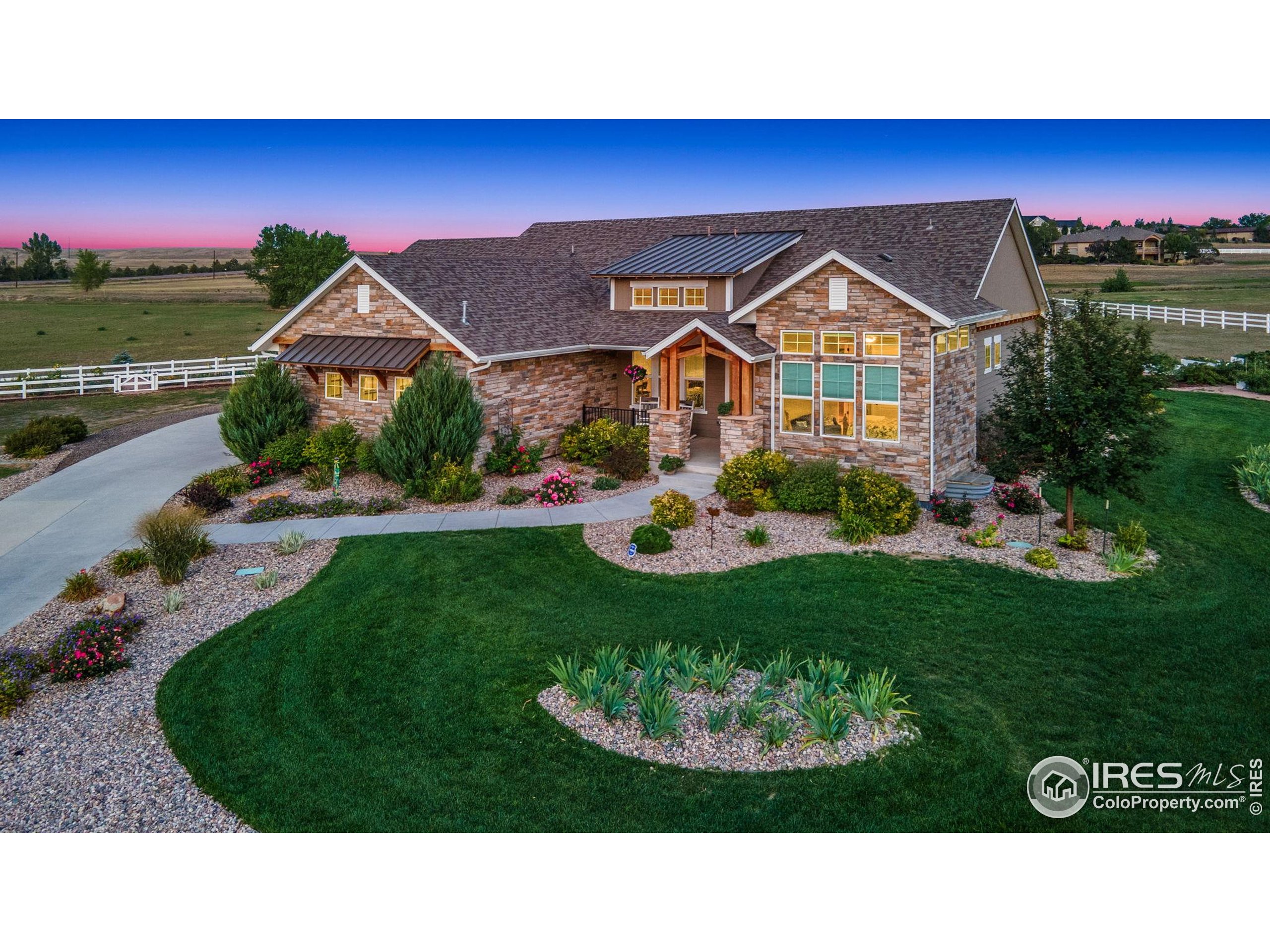 39884 Ridgecrest Court Severance, CO 80610 - Photo 6 of 44 a view of a house with a backyard