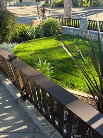 a view of a swimming pool with a garden