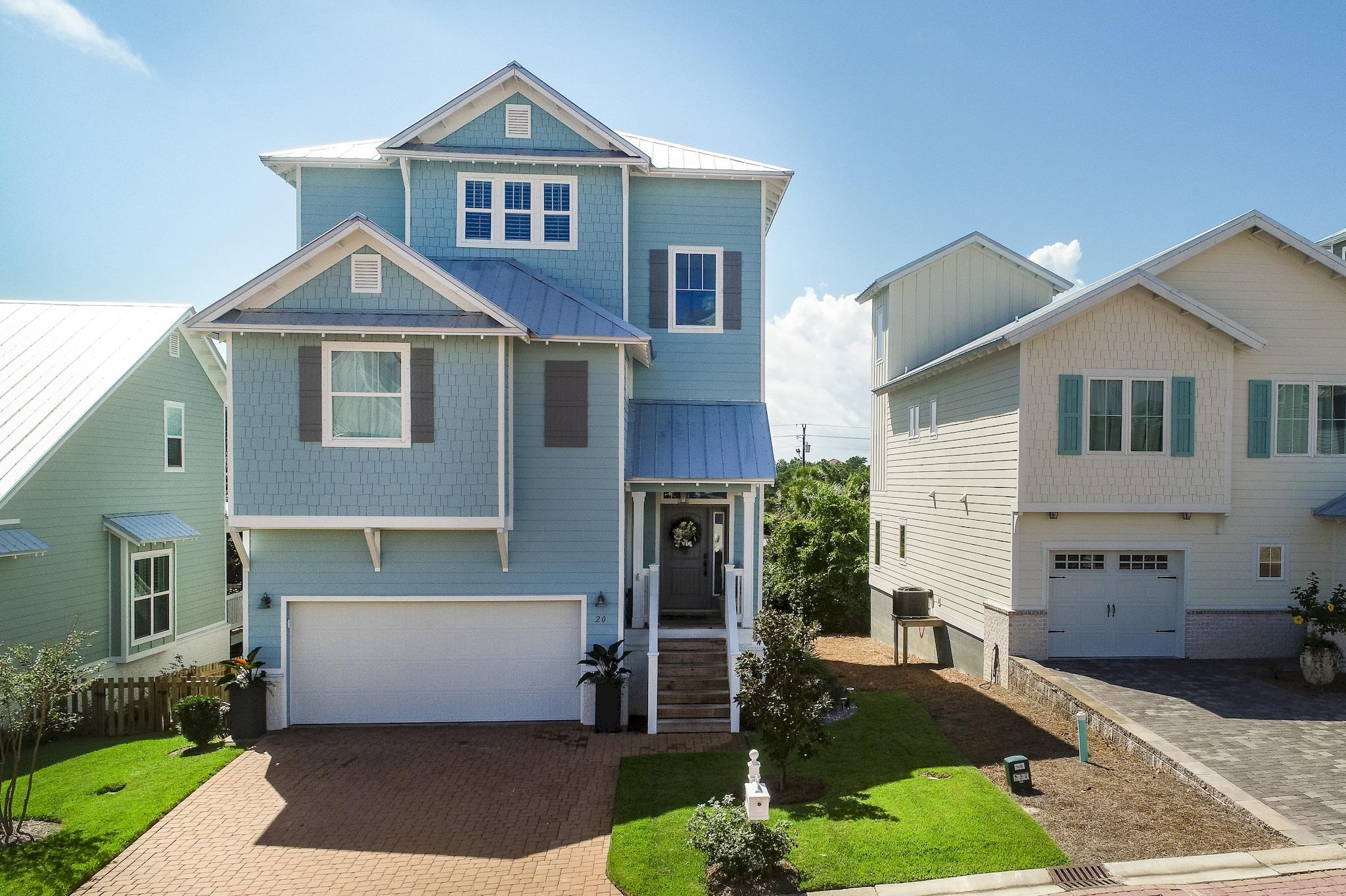 20 Inlet Cove Inlet Beach, FL 32461 - Photo 1 of 50 a front view of a house with garden