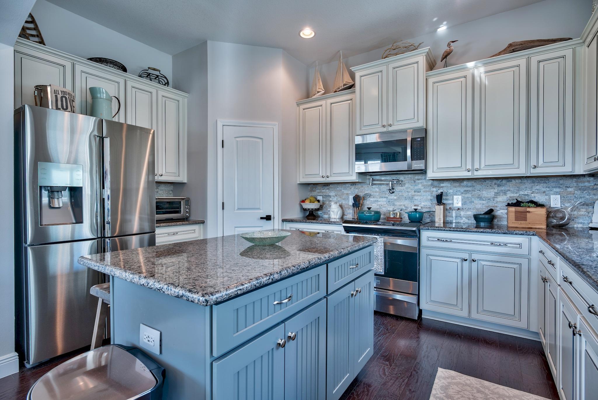 20 Inlet Cove Inlet Beach, FL 32461 - Photo 14 of 50 a kitchen with stainless steel appliances granite countertop a sink stove and refrigerator