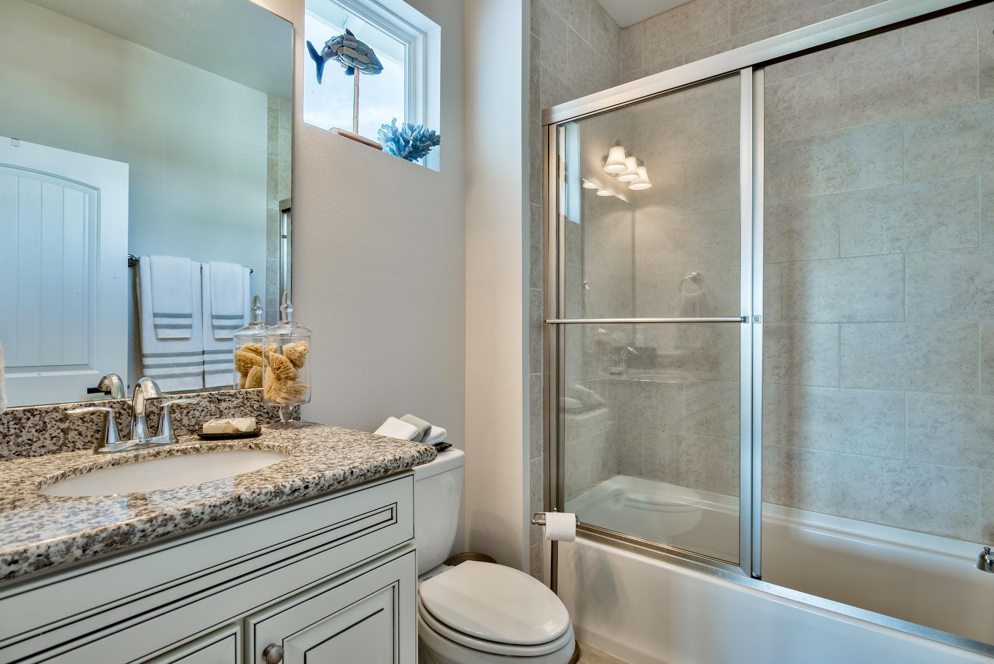 20 Inlet Cove Inlet Beach, FL 32461 - Photo 17 of 50 a bathroom with a granite countertop sink toilet and shower