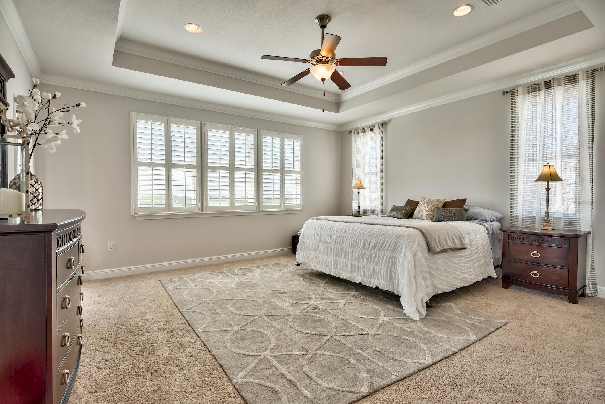 20 Inlet Cove Inlet Beach, FL 32461 - Photo 20 of 50 a bedroom with a bed chandelier and a window
