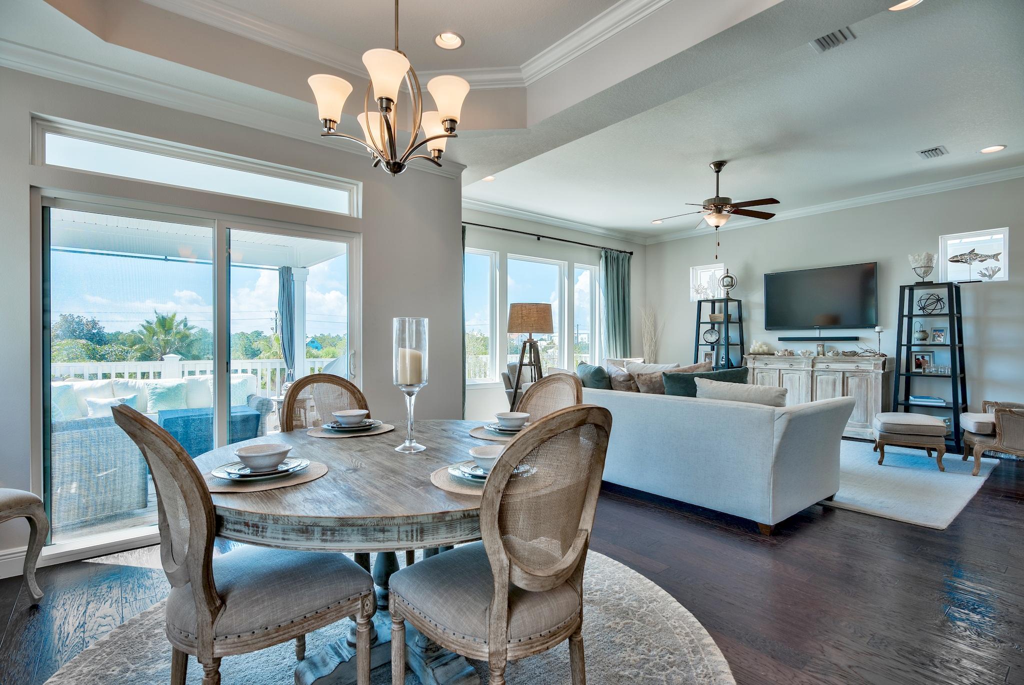 20 Inlet Cove Inlet Beach, FL 32461 - Photo 9 of 50 a view of a dining room with furniture a chandelier and wooden floor