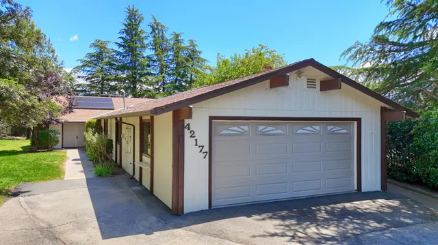 a view of a house with a garage