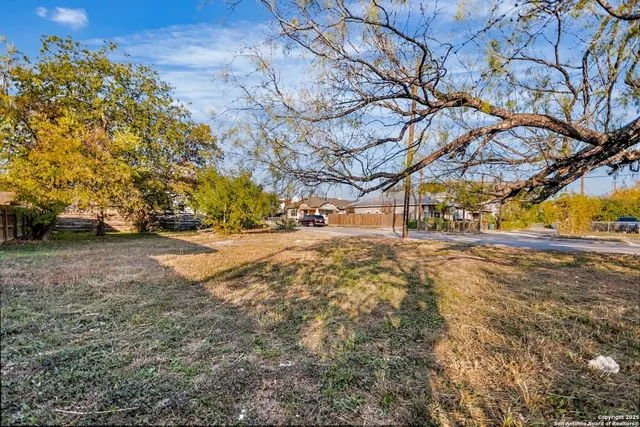 a view of yard covered with snow