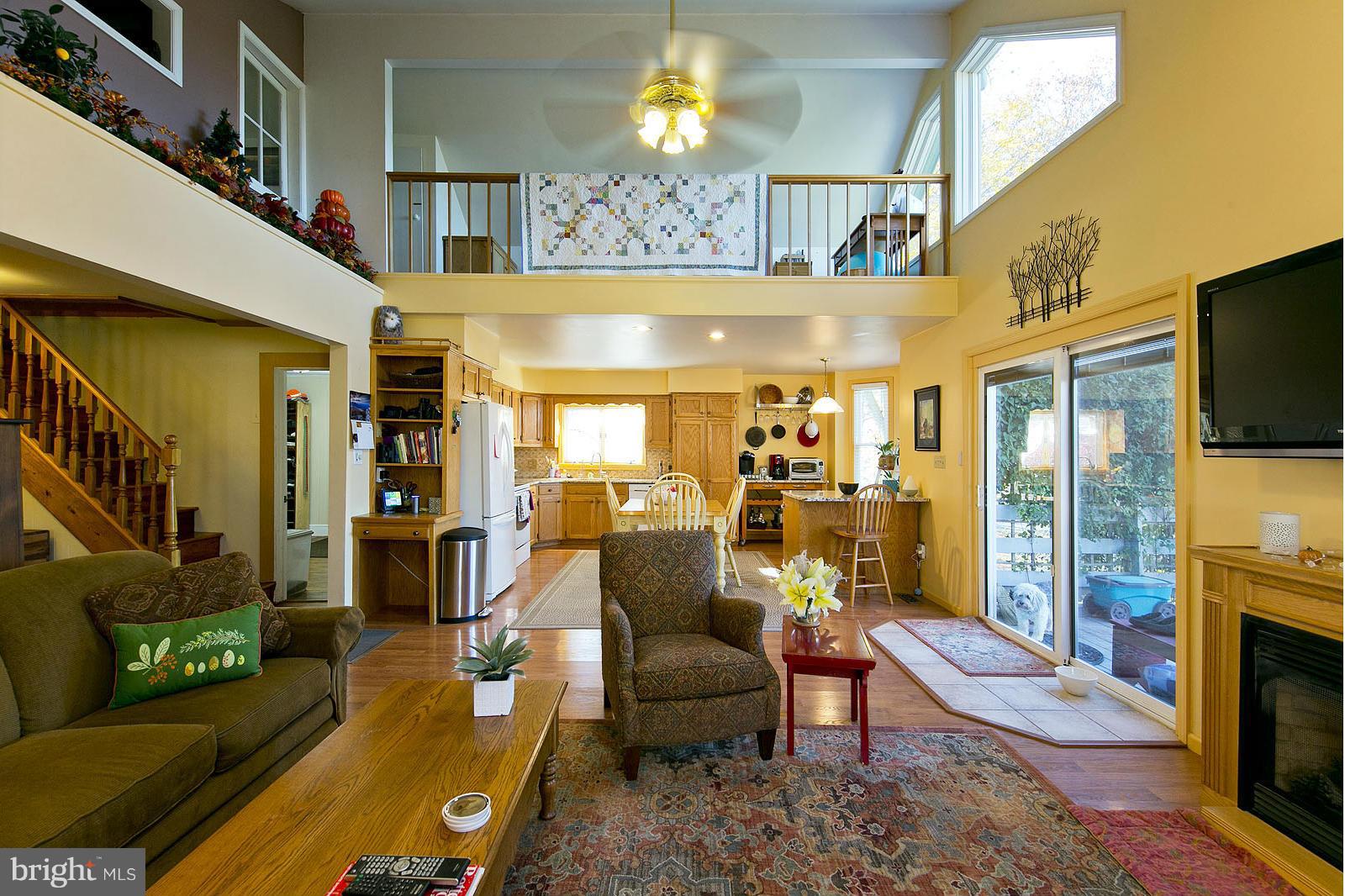 128 Old Baltimore Road Winchester, VA 22603 - Photo 10 of 30 Family Room shows loft on 2nd floor