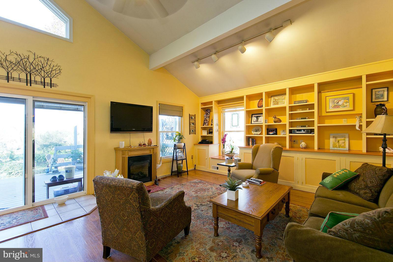 128 Old Baltimore Road Winchester, VA 22603 - Photo 6 of 30 Family Room with sliding glass door to deck