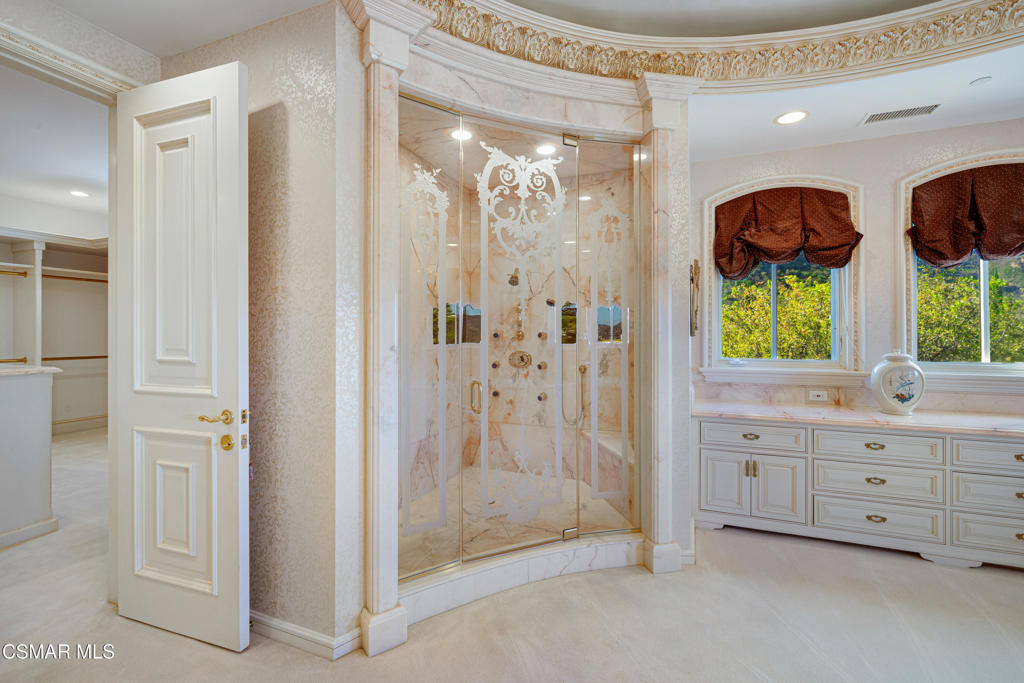 900 West Stafford Road Thousand Oaks, CA 91361 - Photo 58 of 73 a bathroom with double vanity windows and a shower
