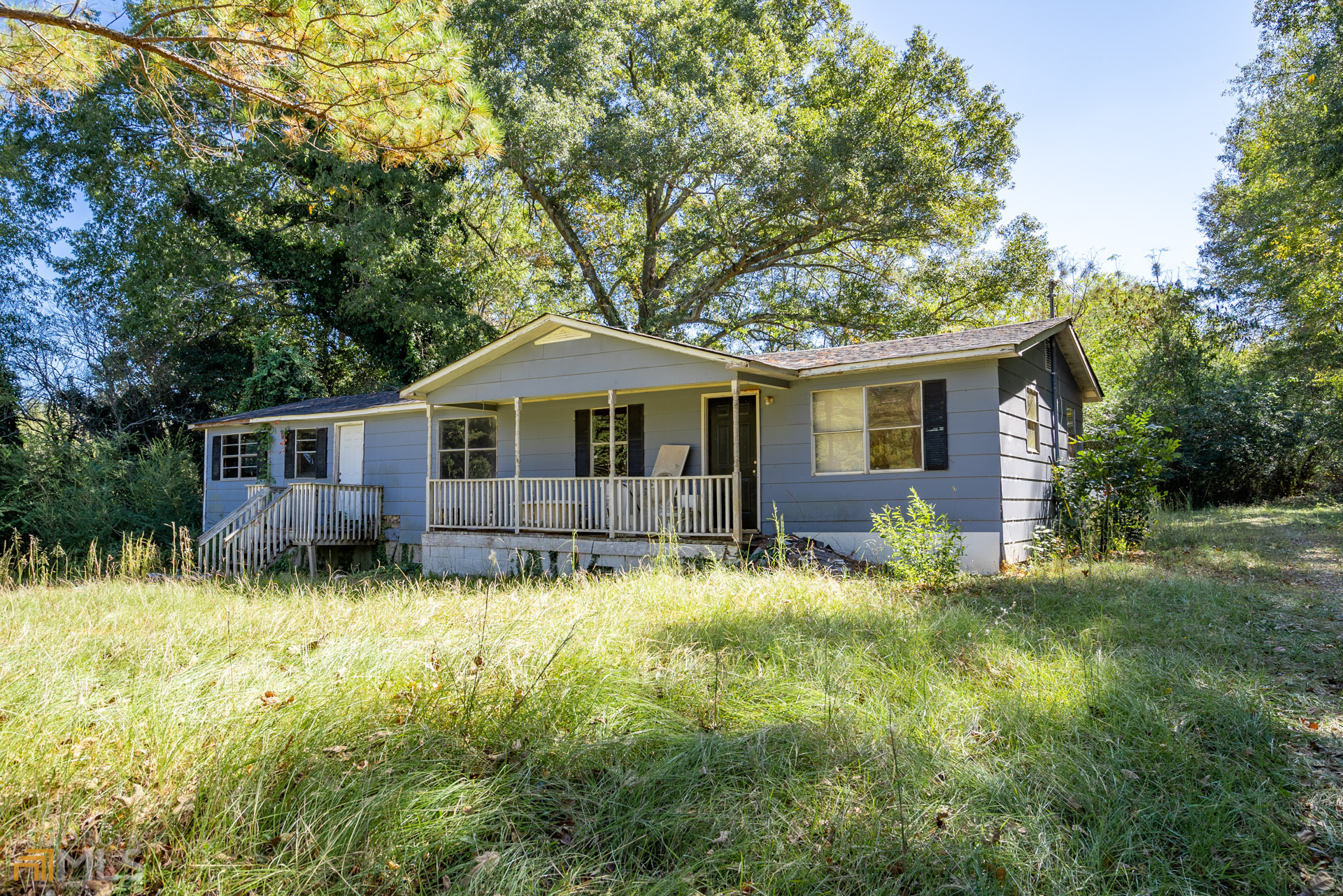 1770 Clack Road Madison, GA 30650 - Photo 1 of 1 a backyard of a house with yard and trampoline