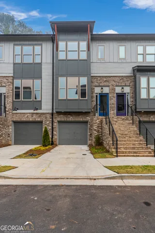 a view of the house with a swimming pool
