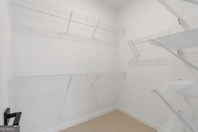 a view of a room with racks on the wall