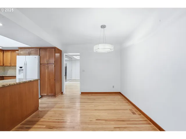 a view of a kitchen with a sink