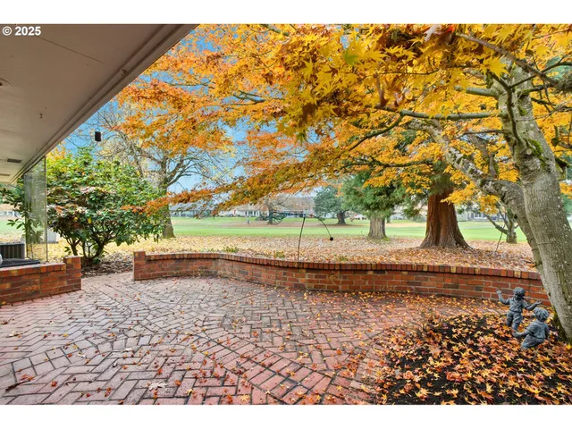 a view of a house with backyard porch and sitting area