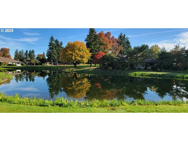 a front view of a house with a yard table and chairs