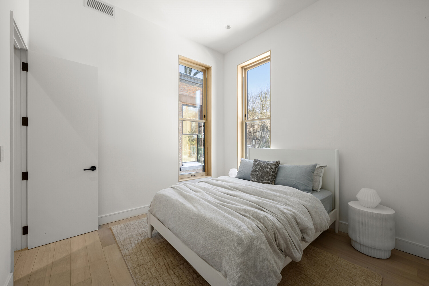 168 Hancock Street, Unit 2 Brooklyn, NY 11216 - Photo 10 of 15 a bedroom with a bed and a window