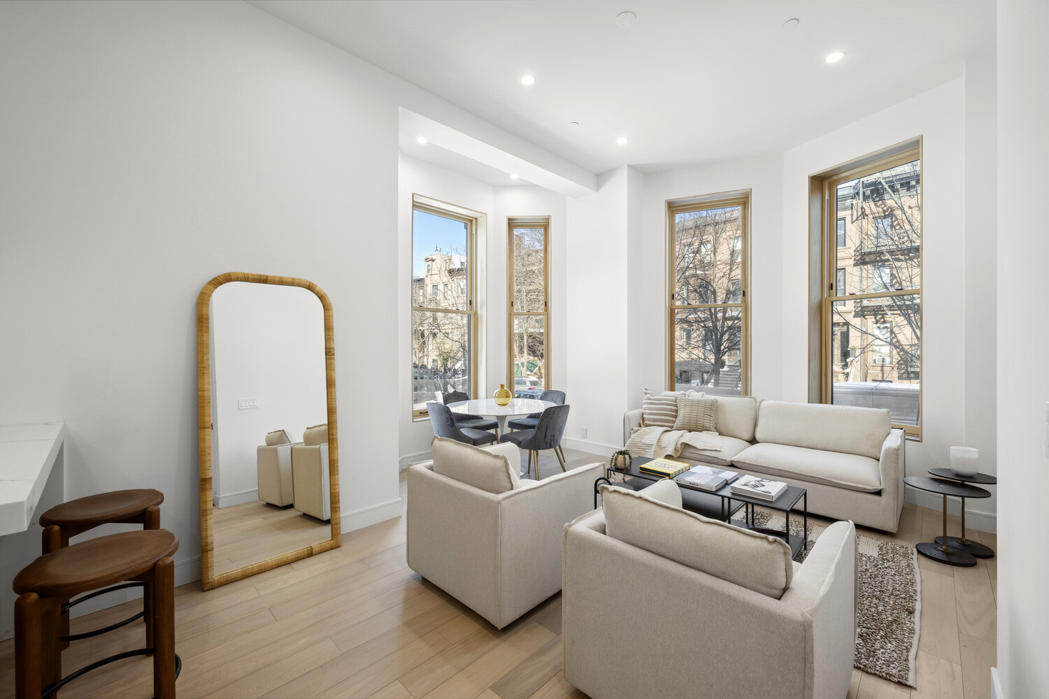 168 Hancock Street, Unit 2 Brooklyn, NY 11216 - Photo 2 of 15 a living room with furniture and a window