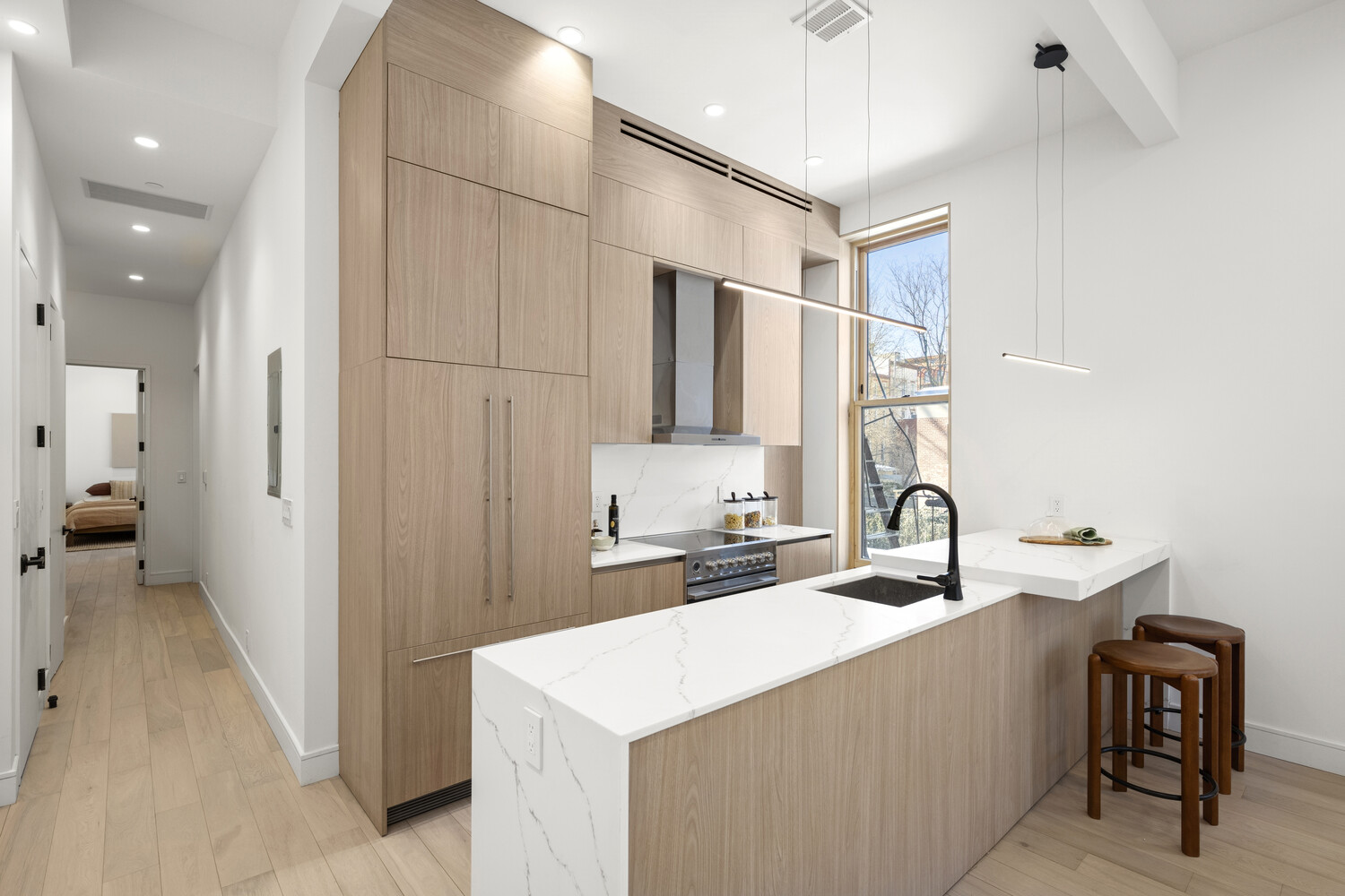 168 Hancock Street, Unit 2 Brooklyn, NY 11216 - Photo 5 of 15 a kitchen with a sink appliances and cabinets