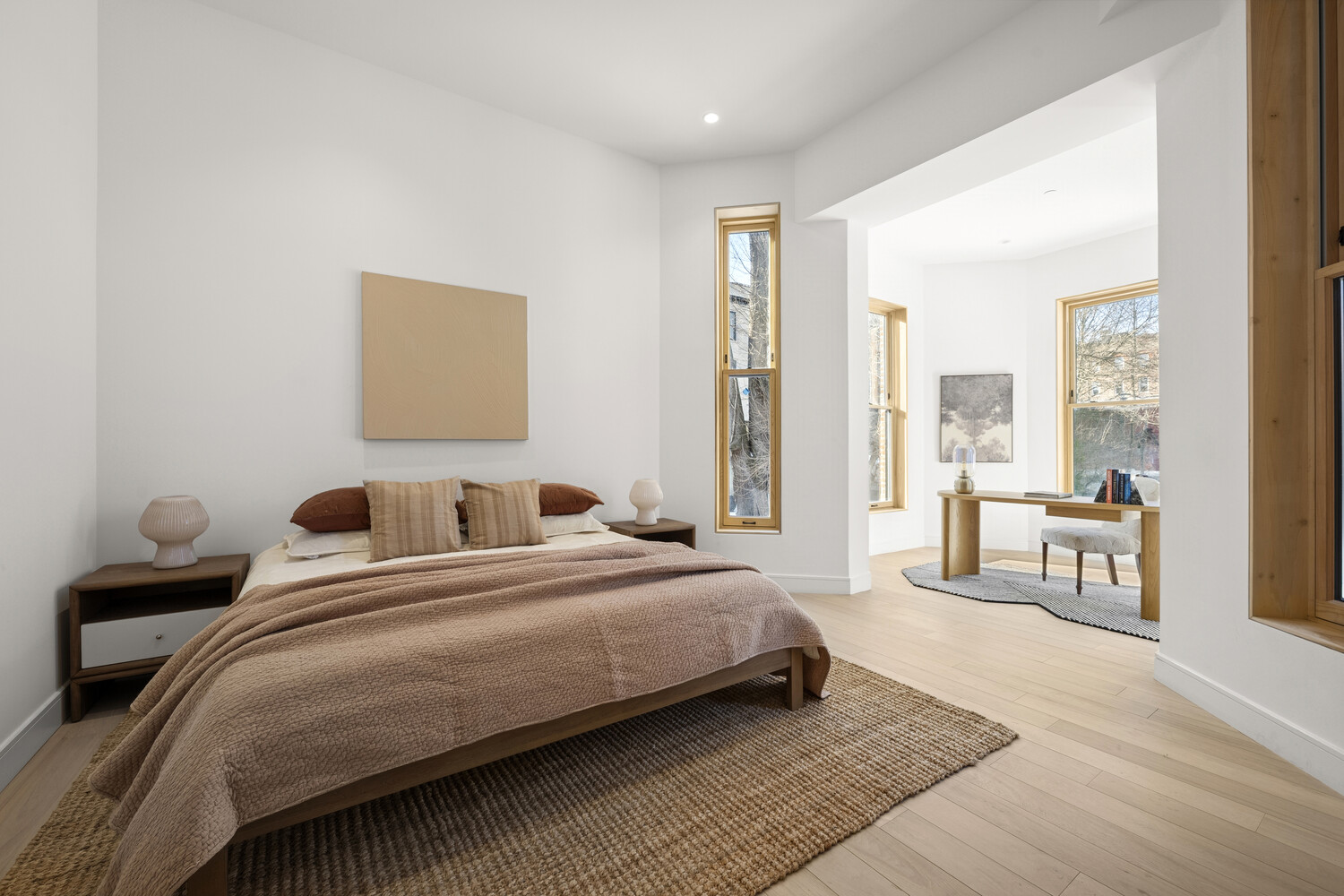 168 Hancock Street, Unit 2 Brooklyn, NY 11216 - Photo 7 of 15 a bedroom with a bed and large windows