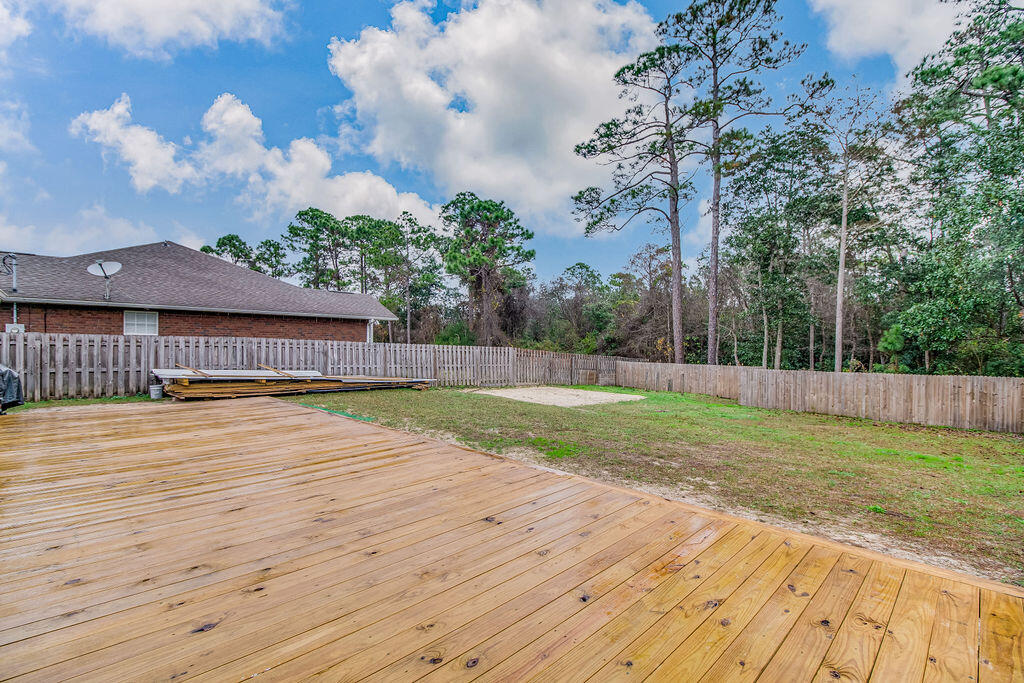 2442 Raider Lane Navarre, FL 32566 - Photo 38 of 46 a view of a backyard