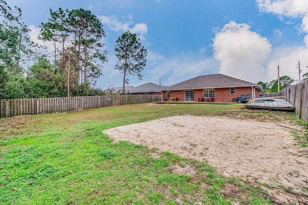 2442 Raider Lane Navarre, FL 32566 - Photo 45 of 46 a view of outdoor space yard and patio