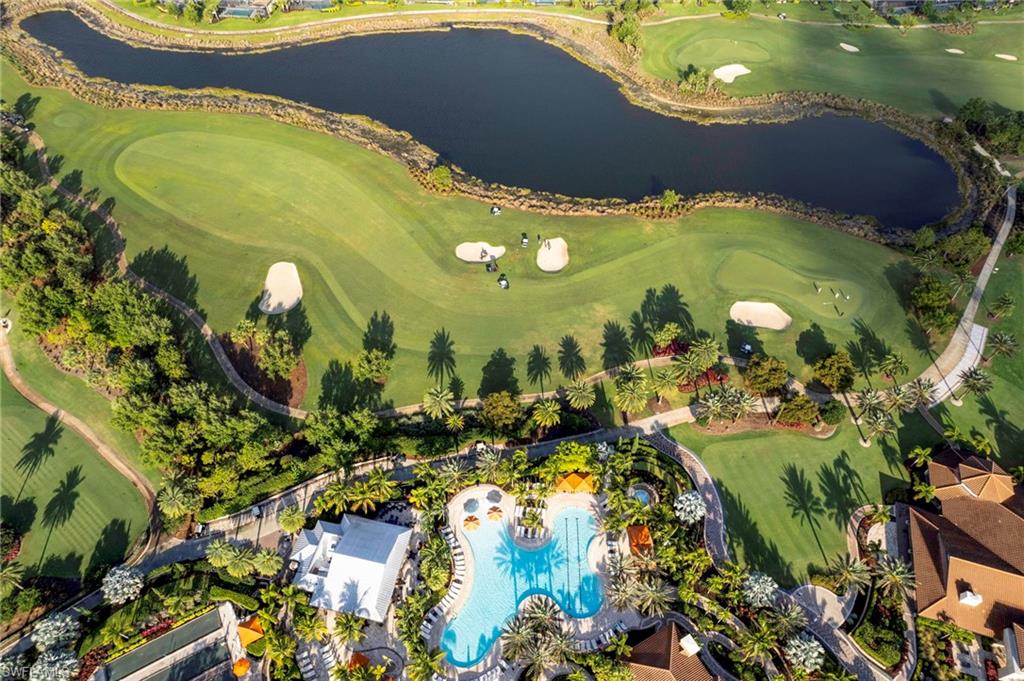 9433 Benvenuto Court, Unit 201 Naples, FL 34119 - Photo 31 of 32 a view of a swimming pool
