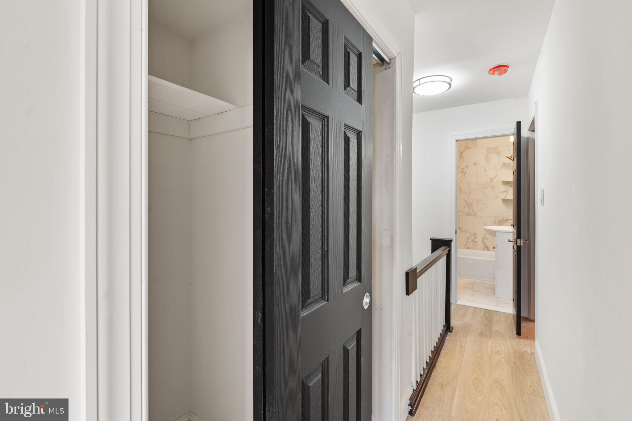 1118 Brown Street Chester, PA 19013 - Photo 22 of 27 a view of a hallway with a white walls