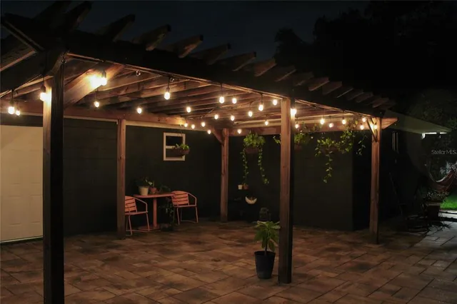 a view of a chairs and tables in patio