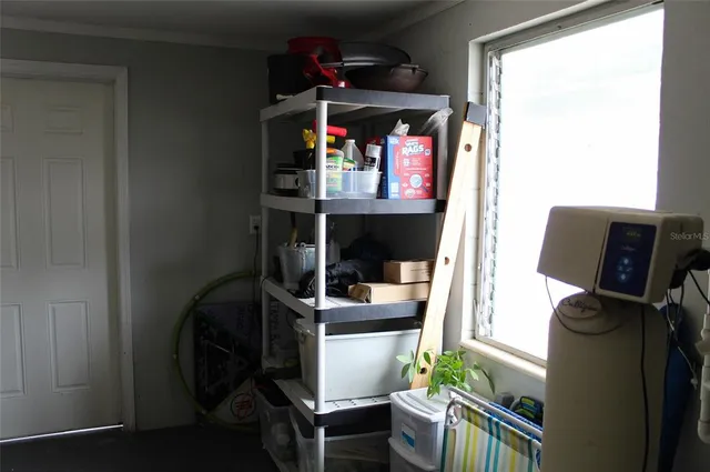 a front view of a house with outdoor seating