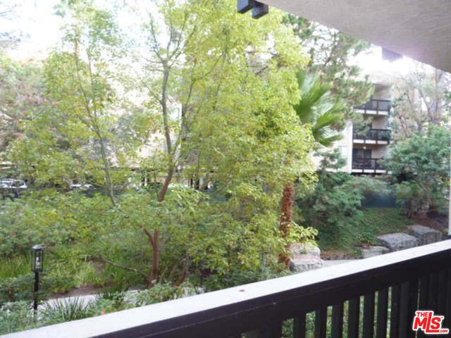 a view of a forest from a window