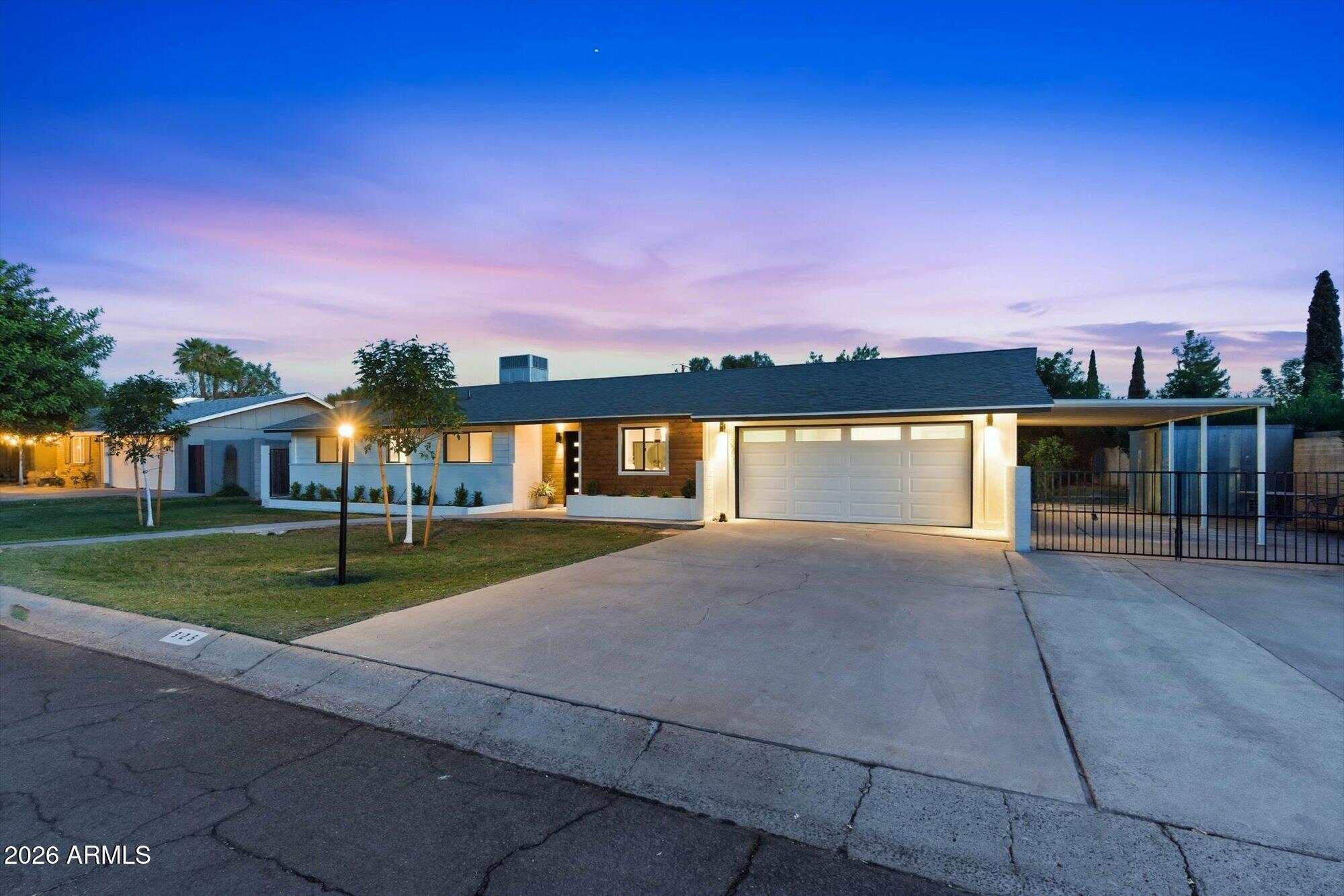 325 West Loma Lane Phoenix, AZ 85021 - Photo 27 of 30 a view of building with outdoor space and trees