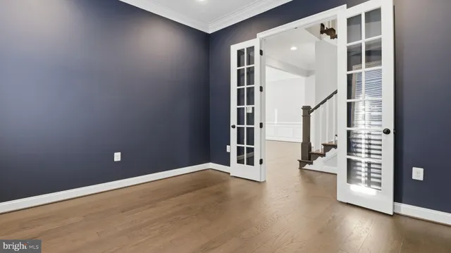 a kitchen with a sink and a refrigerator