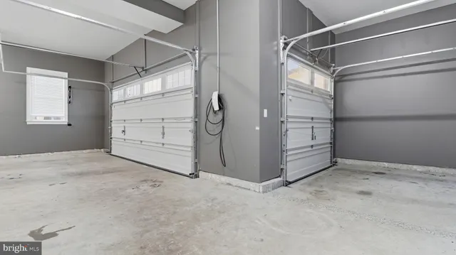 an aerial view of a house with a lake view