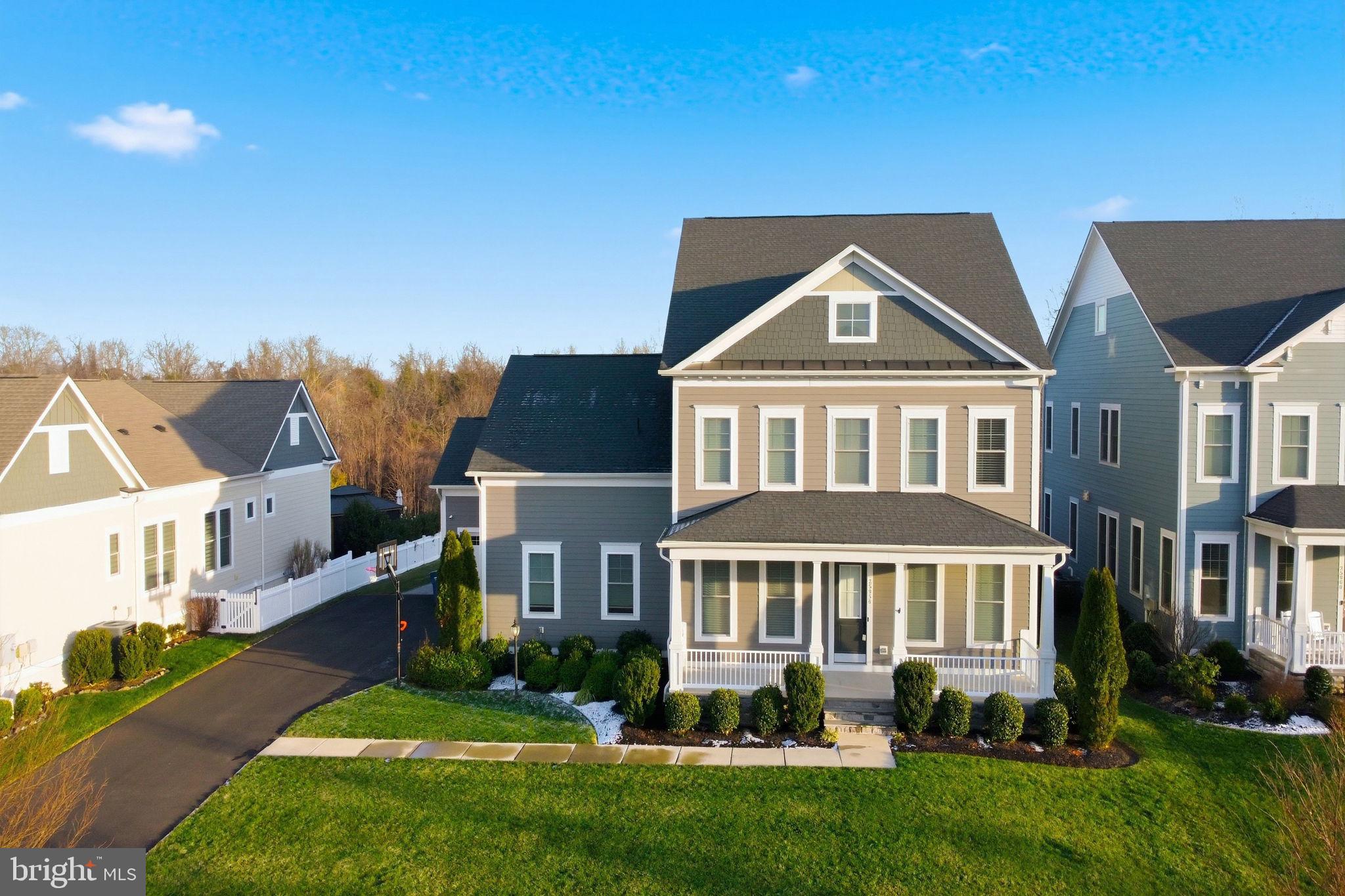 25956 Cullen Run Place Aldie, VA 20105 - Photo 7 of 109 a front view of a house with a yard