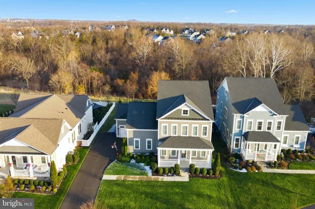 an aerial view of a house with garden space sitting space