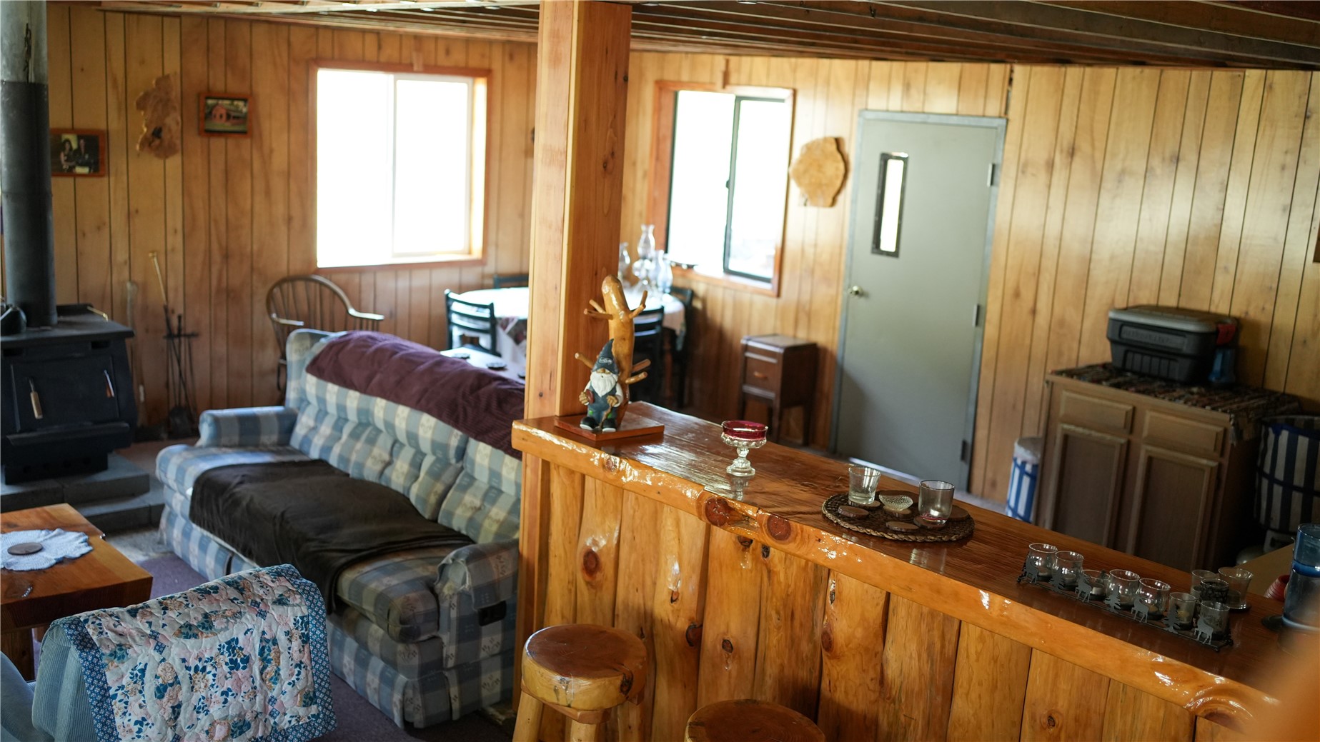 240 Old Railroad Road Oroville, WA 98844 - Photo 15 of 24 a bedroom with furniture and a window
