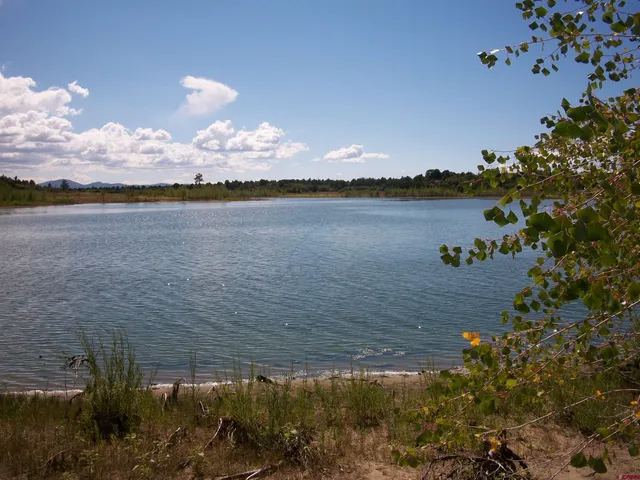 a view of an ocean and a mountain