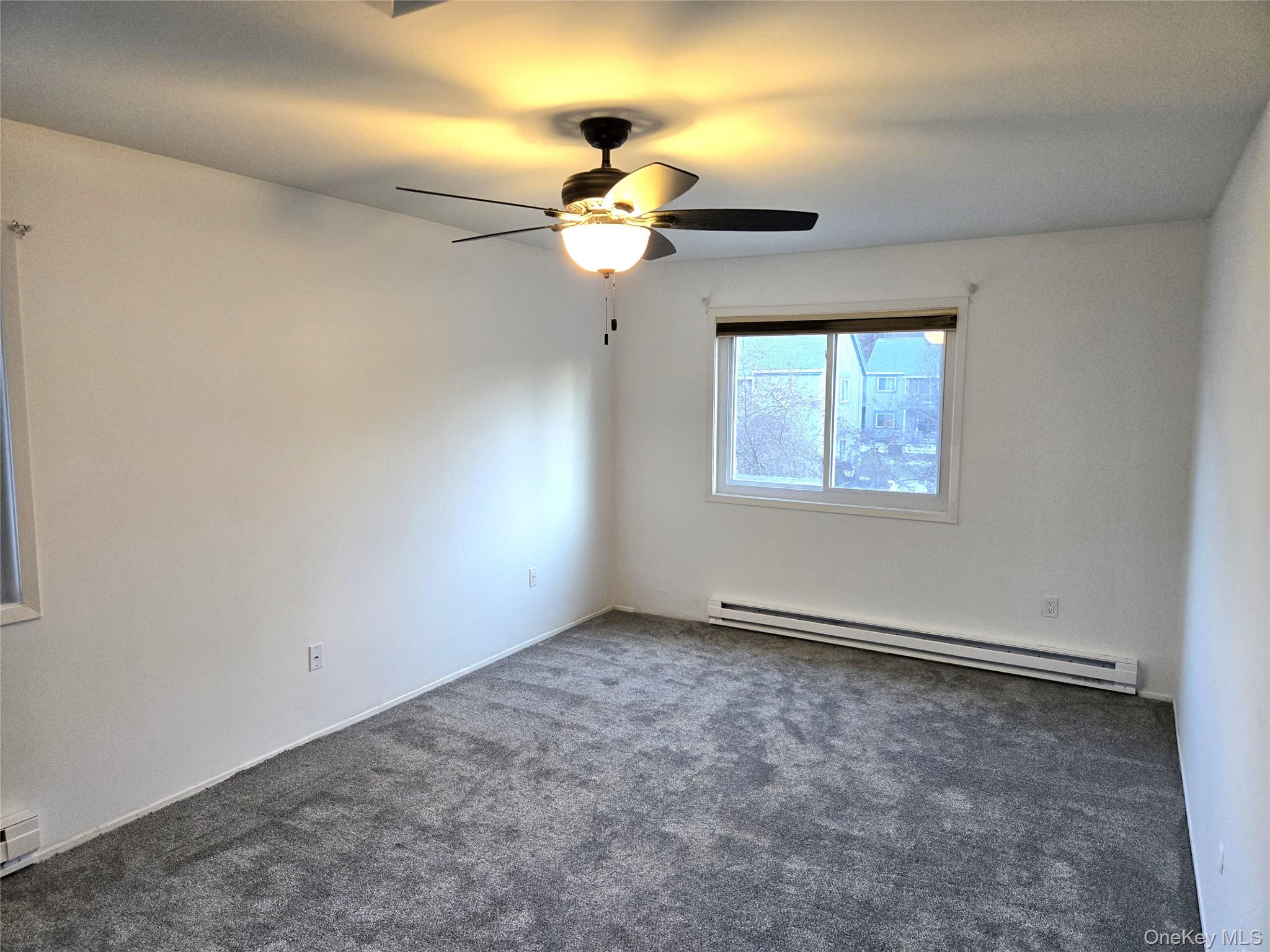110 Sterling Street, Unit 110 Beacon, NY 12508 - Photo 8 of 14 a view of empty room with window
