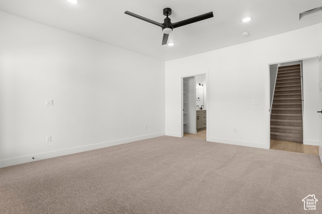 1631 West Century Lane, Unit B Mapleton, UT 84664 - Photo 18 of 33 Unfurnished bedroom with light colored carpet, ceiling fan, recessed lighting, and ensuite bath