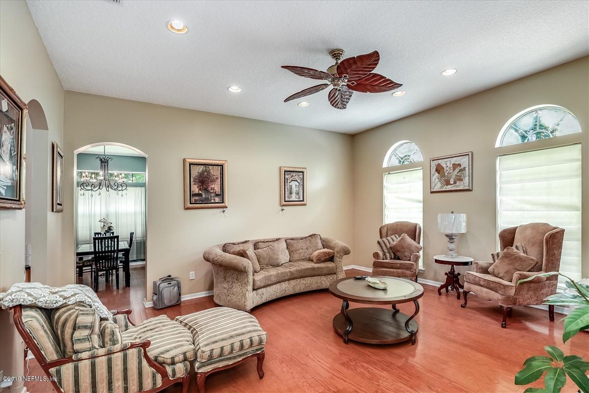 12505 Sampson Road Jacksonville, FL 32218 - Photo 4 of 28 04-Living Room
