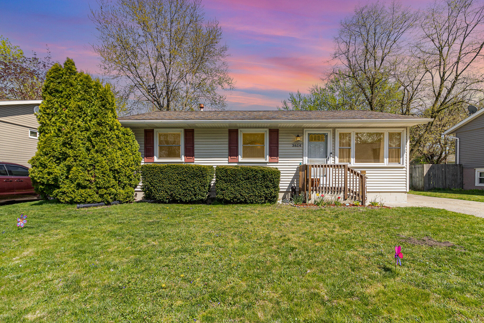 3614 Windsor Road Michigan City, IN 46360 - Photo 1 of 19 a house that has a tree in front of it
