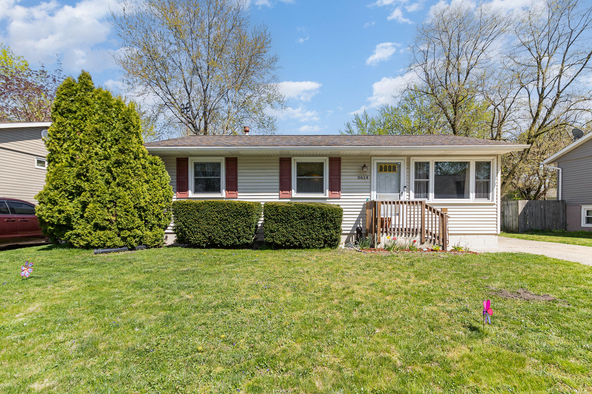 3614 Windsor Road Michigan City, IN 46360 - Photo 4 of 19 a view of a house with a yard and sitting area