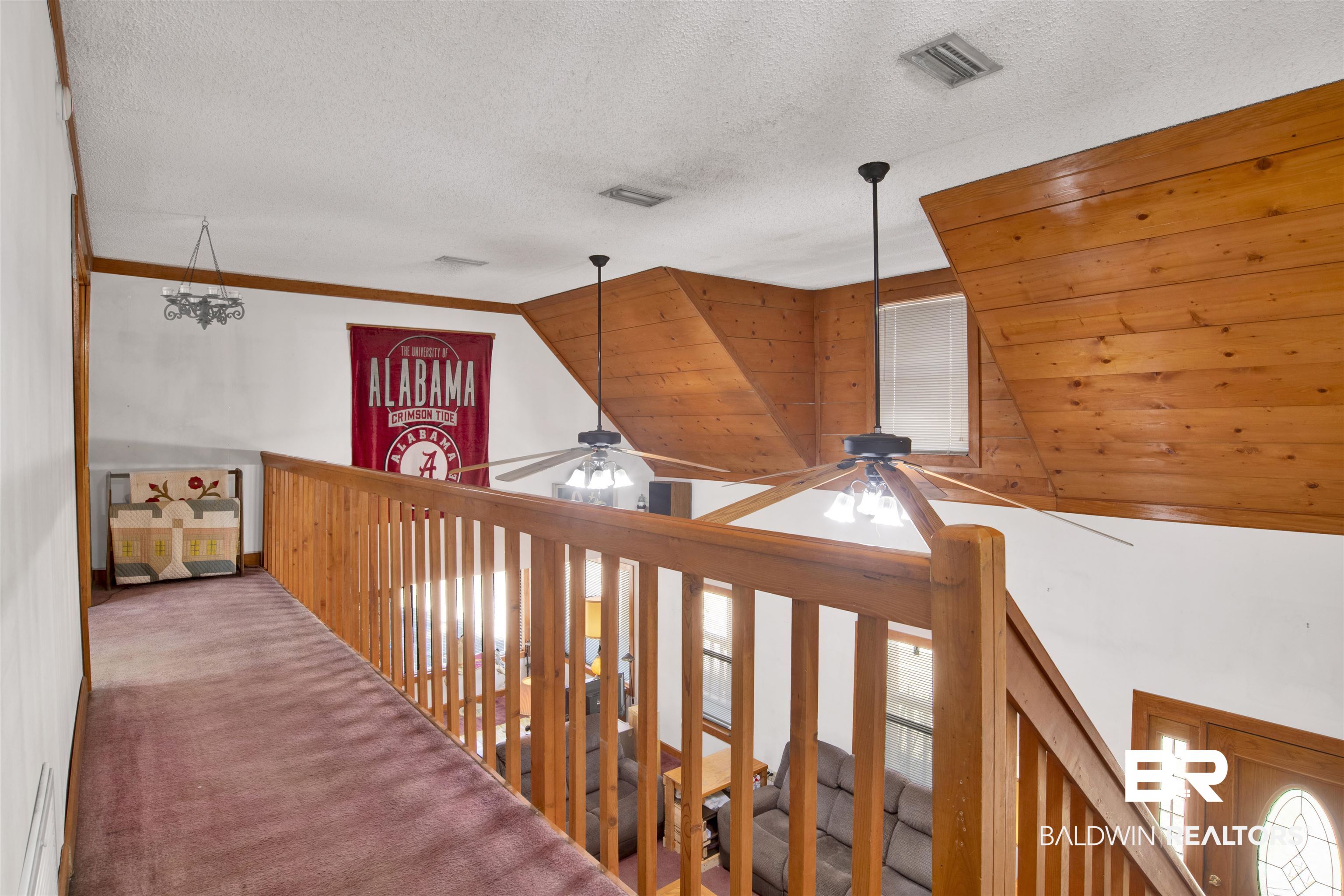 4890 Red Creek Road Semmes, AL 36575 - Photo 22 of 47 Hall featuring a textured ceiling, carpet floors, and plenty of natural light