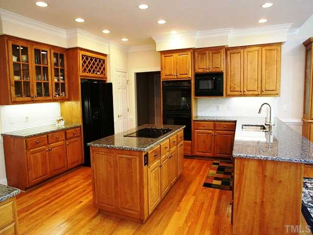 5400 Fire Pink Way Raleigh, NC 27613 - Photo 5 of 23 Huge Kitchen w/ New Granite Counters, Hardwood Floors, Pantry and Lots of Cabinet & Counter Top Space. Kitchen