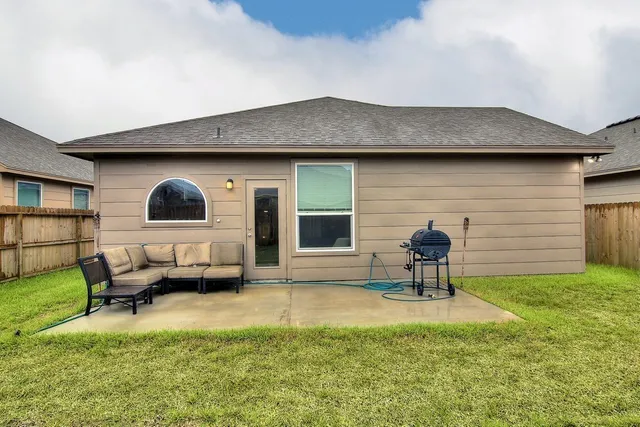 a house view with a outdoor seating space