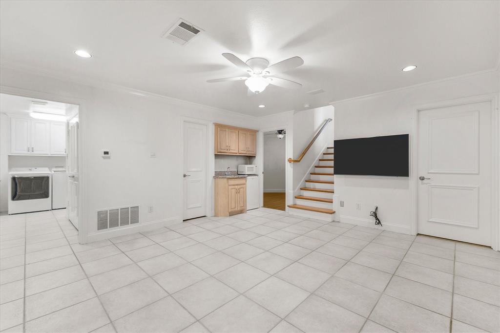 5411 Ranger Drive Rockwall, TX 75032 - Photo 22 of 33 a view of a livingroom with furniture and an entryway