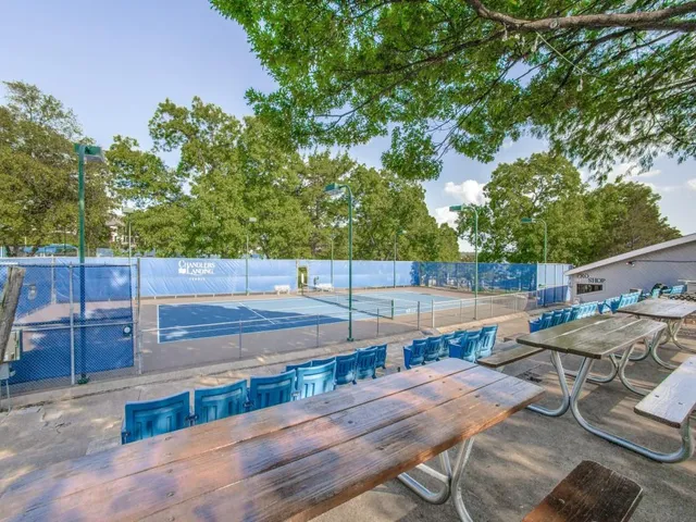 a bathroom with a sink vanity and a mirror