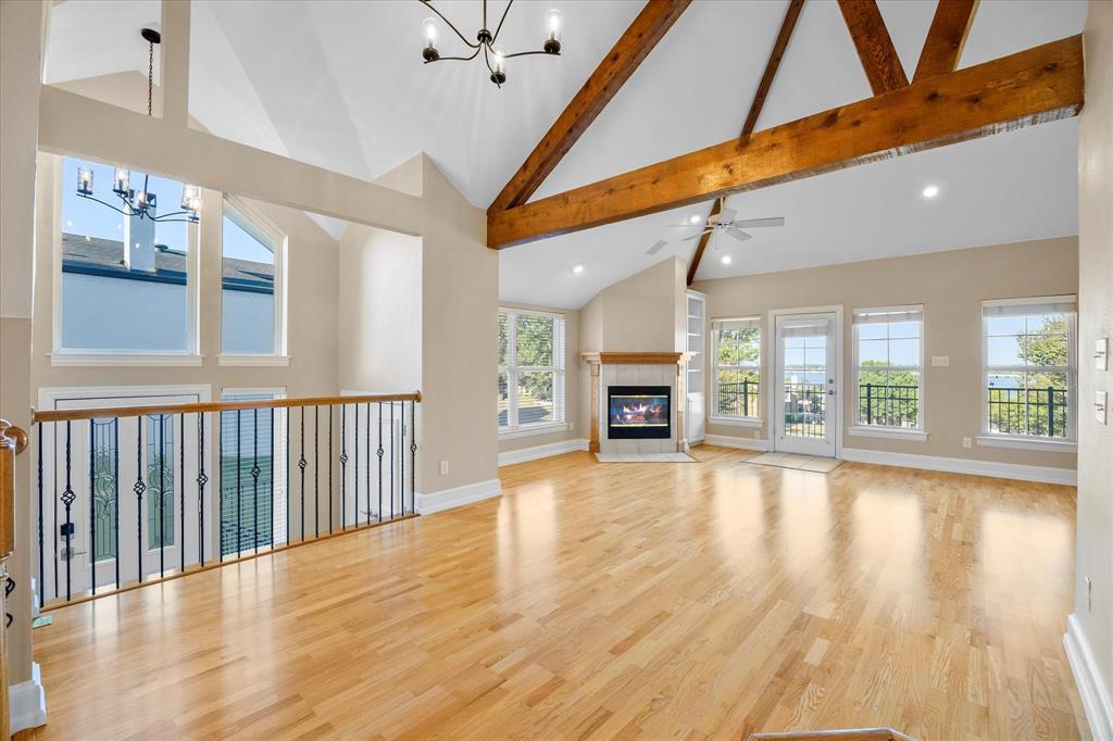 5411 Ranger Drive Rockwall, TX 75032 - Photo 7 of 33 a view of an entryway with floor to ceiling window and wooden floor